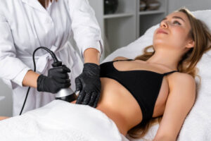 woman getting a body treatment on her stomach